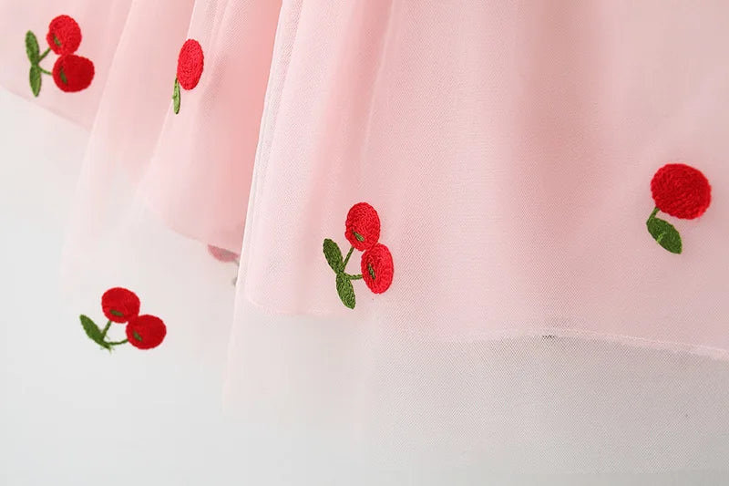 Baby Girl Cherry Dress, Pink or White Layered Skirt with Blue Ruffle Shoulder Straps and Front Bow for Summer Parties and Birthday Photos