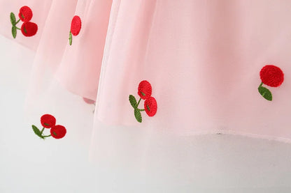 Baby Girl Cherry Dress, Pink or White Layered Skirt with Blue Ruffle Shoulder Straps and Front Bow for Summer Parties and Birthday Photos