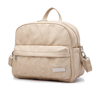Diaper Bag Backpack by Soboba with Front Zipper Pocket, Top Carry Handle and Solid Color Styling for Baby Care Essentials and Everyday Outings