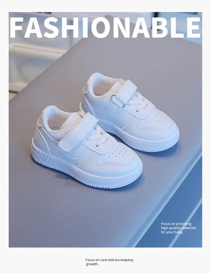 Kids White Low-Top Sneakers with Adjustable Strap, Perforated Toe and Silver Heel Detail for Boys and Girls Spring and Fall Casual Outfits