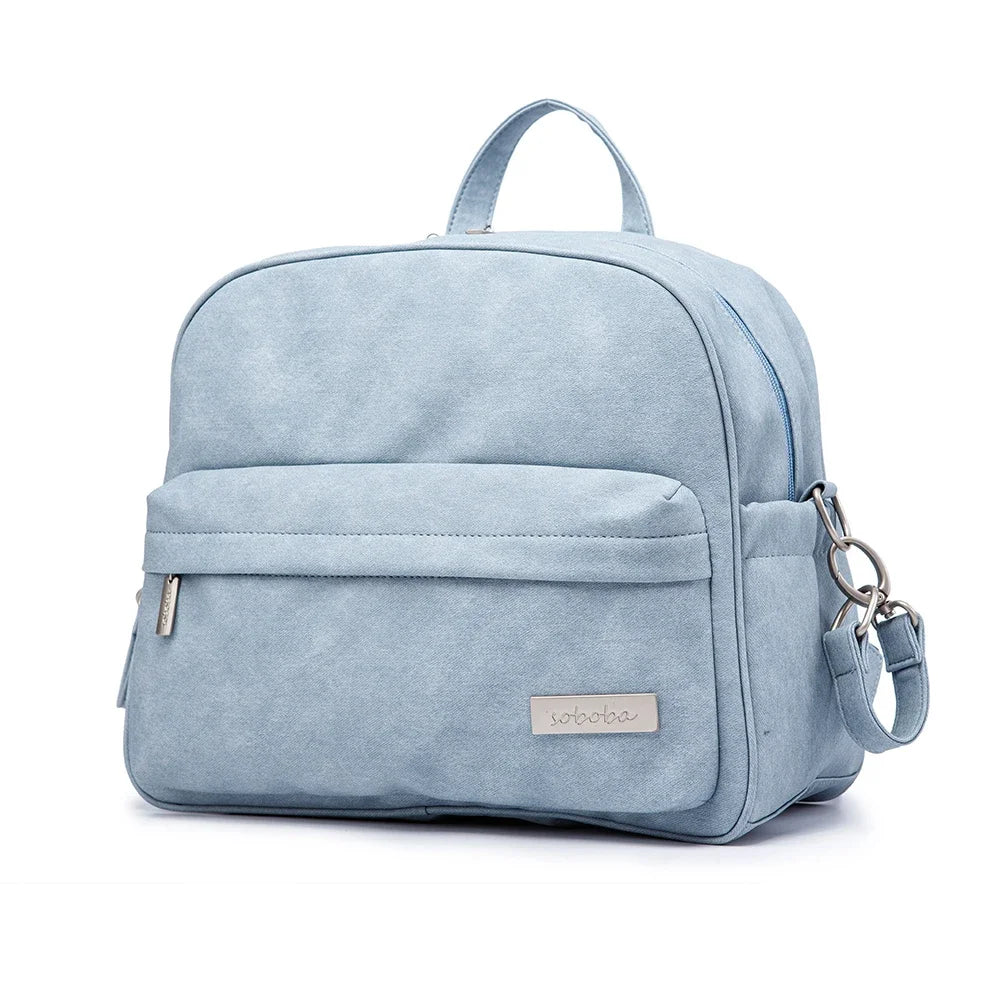 Diaper Bag Backpack by Soboba with Front Zipper Pocket, Top Carry Handle and Solid Color Styling for Baby Care Essentials and Everyday Outings