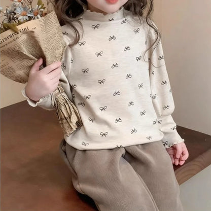 Girls High Neck Long Sleeve Shirt with Allover Bow Print, Beige or Gray Layering Top for Everyday Fall and Winter Outfits and Family Gatherings