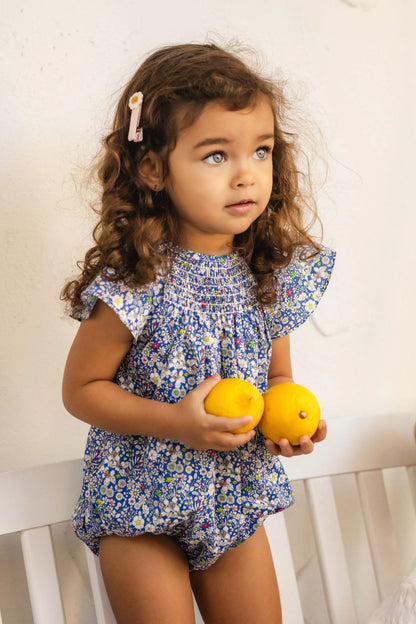Blue Floral Sibling Outfits with Smocked Girls Dress and Baby Romper Options, Coordinating Boys Knit Tops, Polo and Shorts for Family Photos