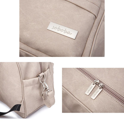 Diaper Bag Backpack by Soboba with Front Zipper Pocket, Top Carry Handle and Solid Color Styling for Baby Care Essentials and Everyday Outings