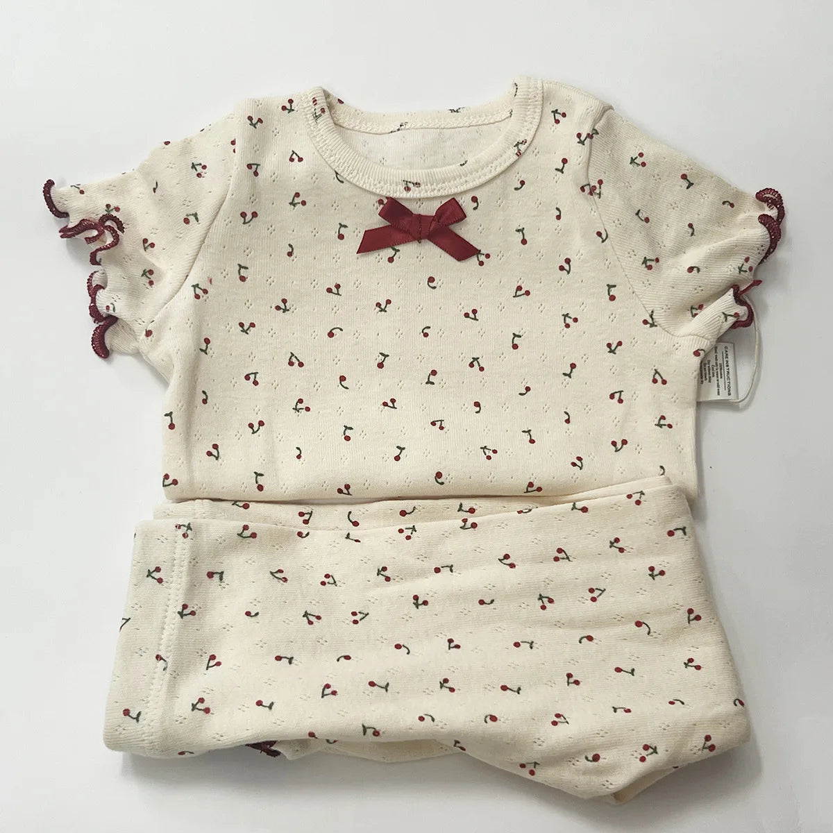 Cherry Print Girls Cotton Pajama Set, Cream Long Sleeve Top and Matching Pants with Red Picot Trim, Two-Piece Toddler Homewear, 1-6T
