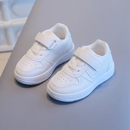 Kids White Low-Top Sneakers with Adjustable Strap, Perforated Toe and Silver Heel Detail for Boys and Girls Spring and Fall Casual Outfits