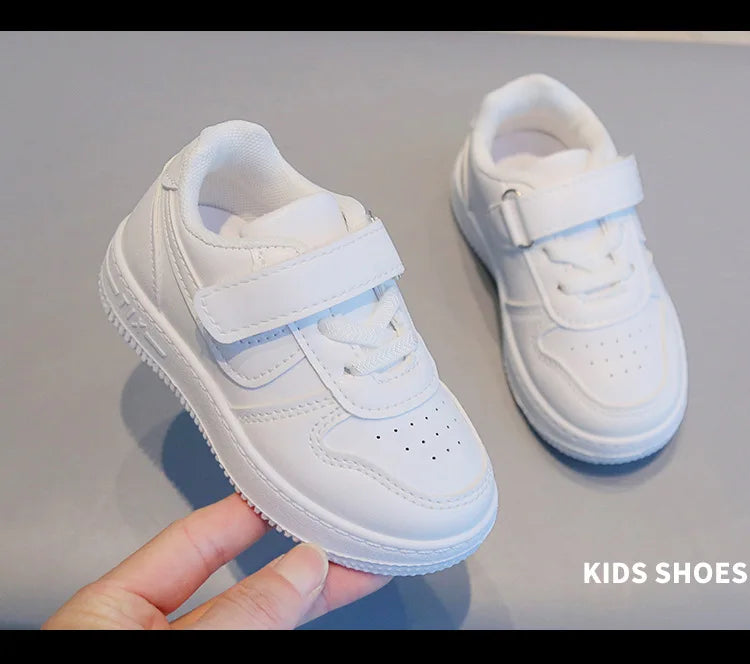 Kids White Low-Top Sneakers with Adjustable Strap, Perforated Toe and Silver Heel Detail for Boys and Girls Spring and Fall Casual Outfits