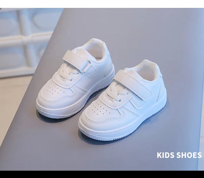 Kids White Low-Top Sneakers with Adjustable Strap, Perforated Toe and Silver Heel Detail for Boys and Girls Spring and Fall Casual Outfits