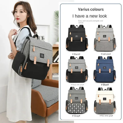 Flap-Top Diaper Backpack with Front Storage Pockets, Two Stroller Hooks and 53 x 34 cm Changing Mat for Baby Essentials and Everyday Parent Outings