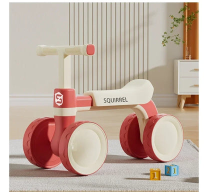 Toddler Four-Wheel Ride-On Bike in Green or Orange with Pedal-Free Design, Straight Handlebars and Shaped Seat for Supervised Play