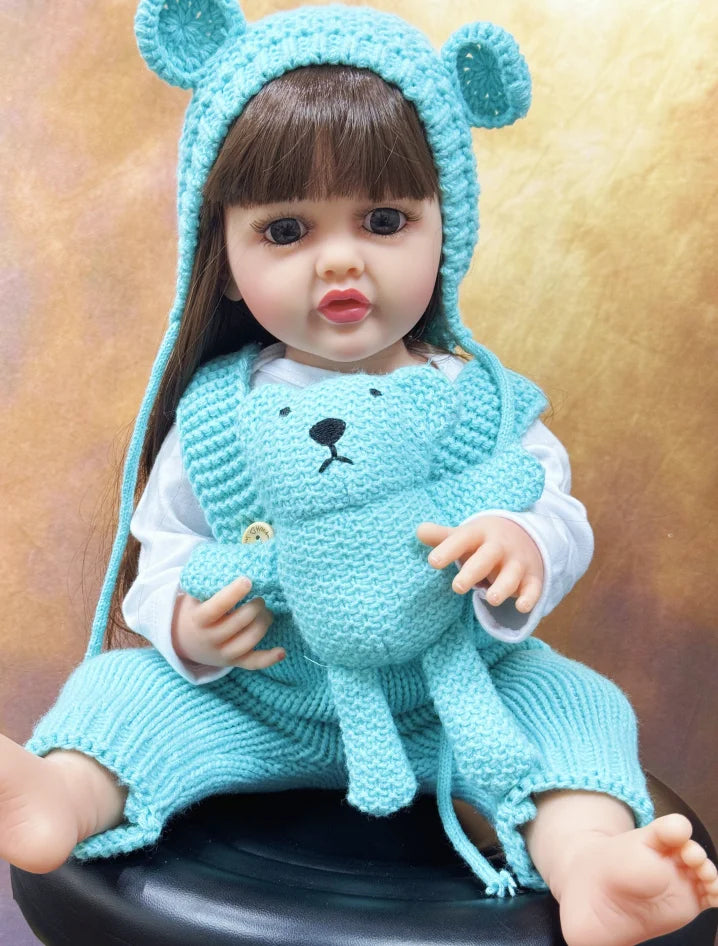 Long Hair Reborn Girl Doll with Fixed Acrylic Eyes, 20 Inch Toddler-Style Doll with Movable Limbs, Clothes, Magnetic Pacifier and Bottle
