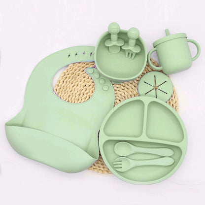 Baby Silicone Tableware Set, 9-Piece Mealtime Collection with Divided Plate, Suction Bowl, Pocket Bib, 2-in-1 Cup and Utensils in Four Colors