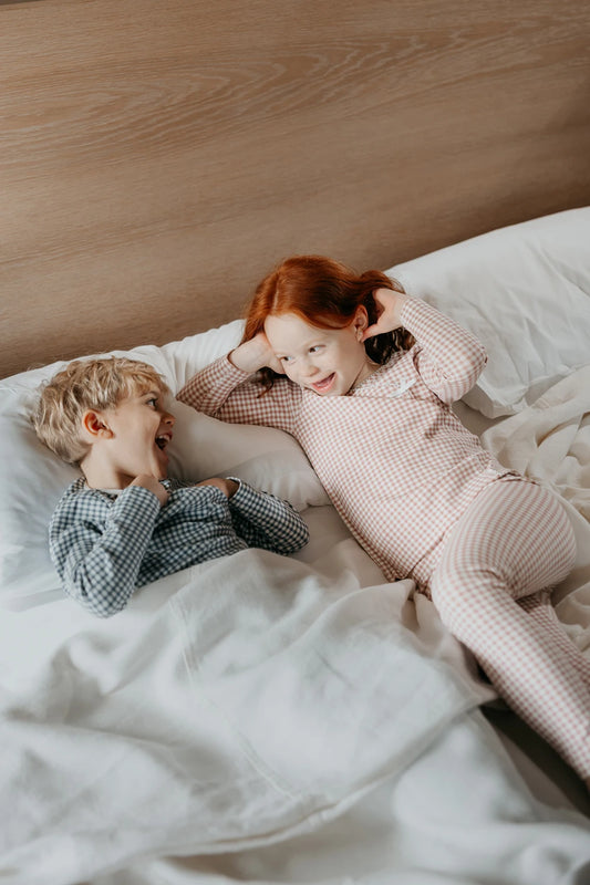 Matching Plaid Pajamas for Kids and Babies, Cotton Long-Sleeve Two-Piece Sets and Footed Rompers in Pink or Blue for Coordinated Sibling Outfits