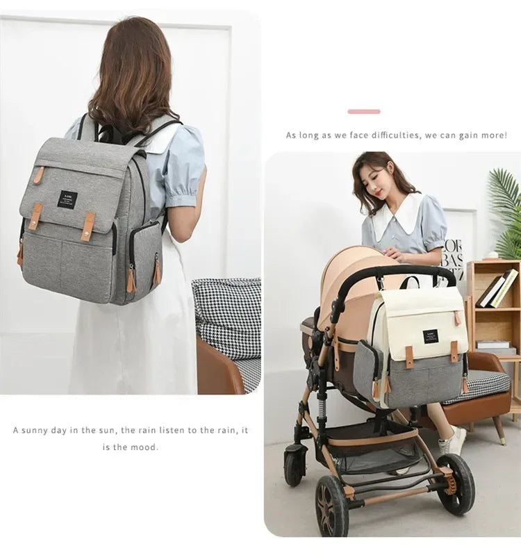 Flap-Top Diaper Backpack with Front Storage Pockets, Two Stroller Hooks and 53 x 34 cm Changing Mat for Baby Essentials and Everyday Parent Outings